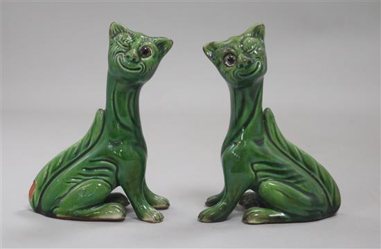 A pair of Louis Wain style pottery cats height 13cm